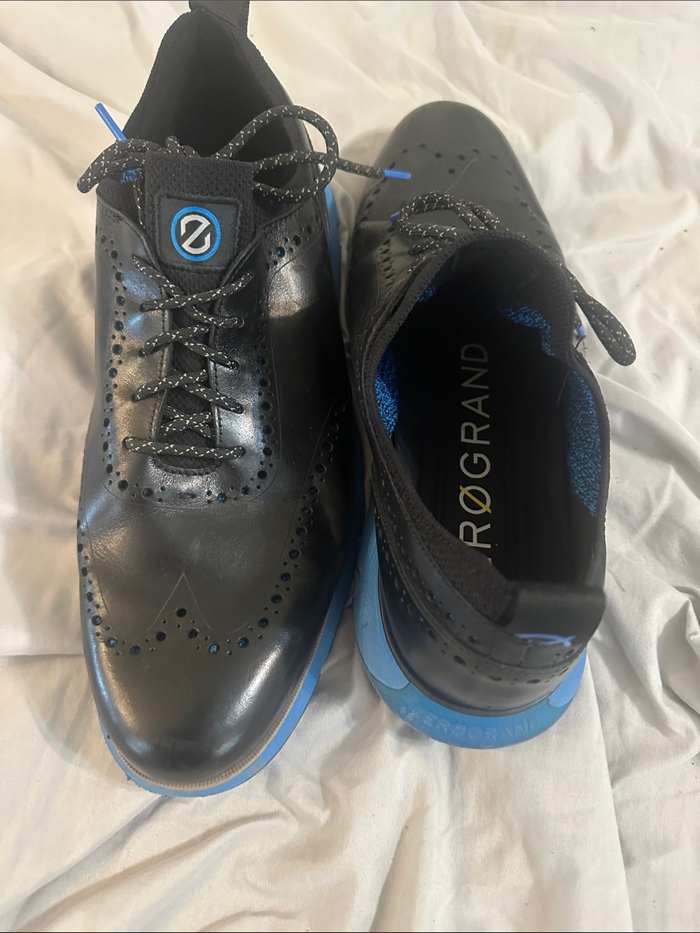 Cole Haan Black Leather Wingtip Oxfords with Blue Soles and Accents